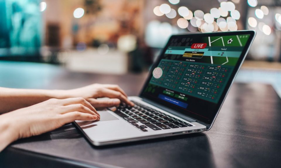 How do live casino dealers interact with players